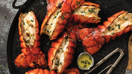Whole or half lobster tails broiled in the oven and served with melted butter