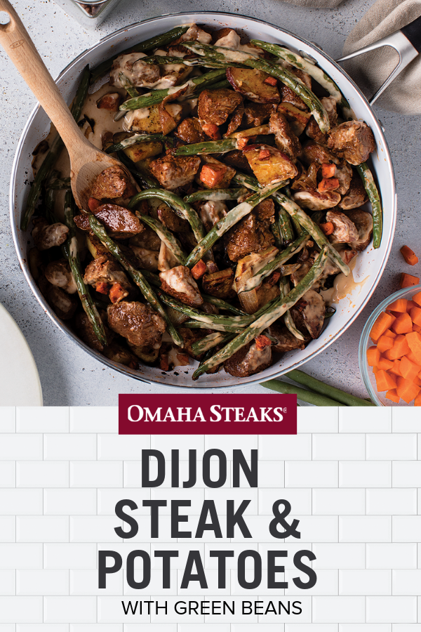 Easy Dijon steak and potatoes with green beans recipe with filet mignon tips, green beans, carrots, Dijon mustard and a cream sauce. Ready in under 30 minutes on the stove, this recipe will become a new family favorite meal.