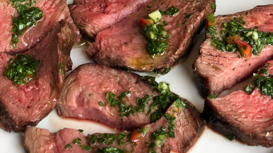 sliced top sirloin with chimmichuri sauce