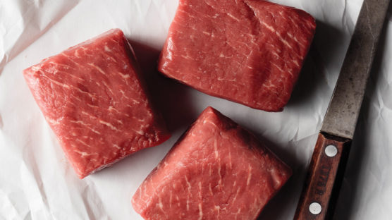 top sirloin steak on butcher's paper