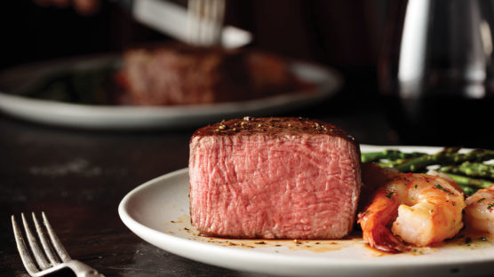 filet mignon and shrimp dinner with wine