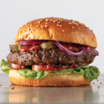 Burger with onions, tomato, lettuce and pickles
