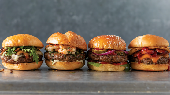 mushroom burger, shrimp roll burger, bbq bacon burger and classic american burger in a row