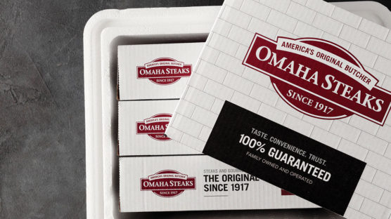 Omaha Steaks boxes in a white cooler