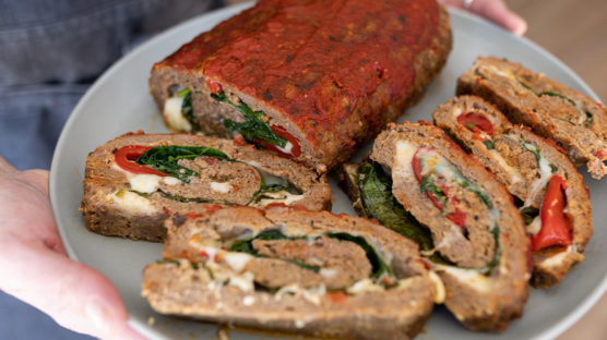 Italian style meatloaf stuffed with provolone cheese, spinach and roasted red peppers in a pinwheel presentation. This is an incredible comfort food meal