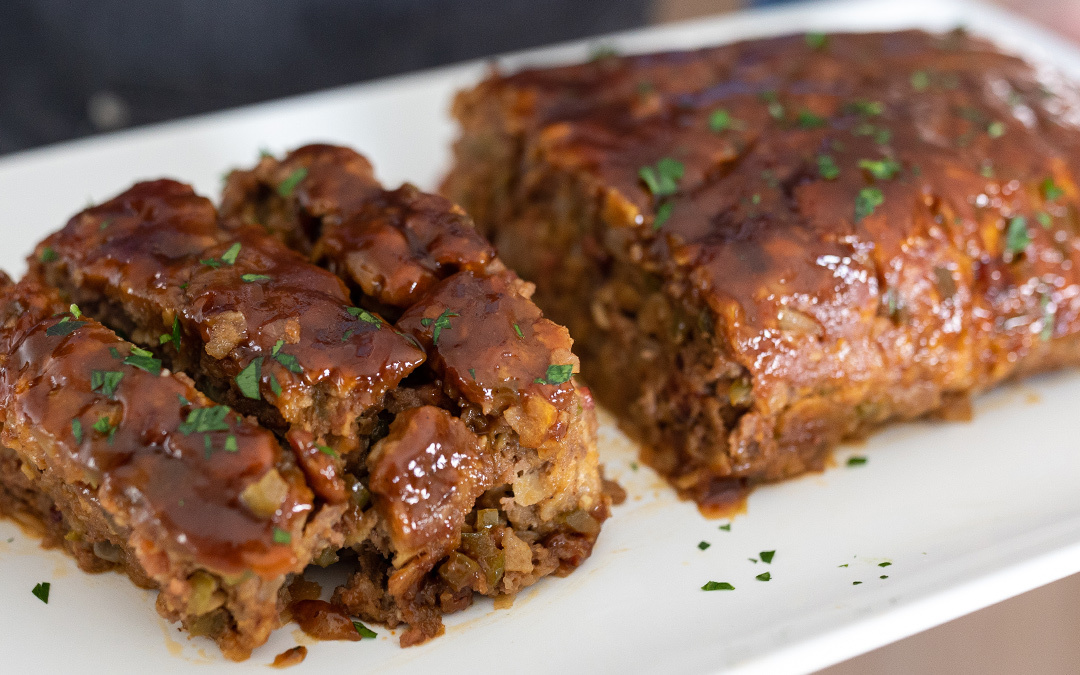 Smoked BBQ meatloaf made with Omaha Steaks premium ground beef, smoked, and topped with a BBQ glaze