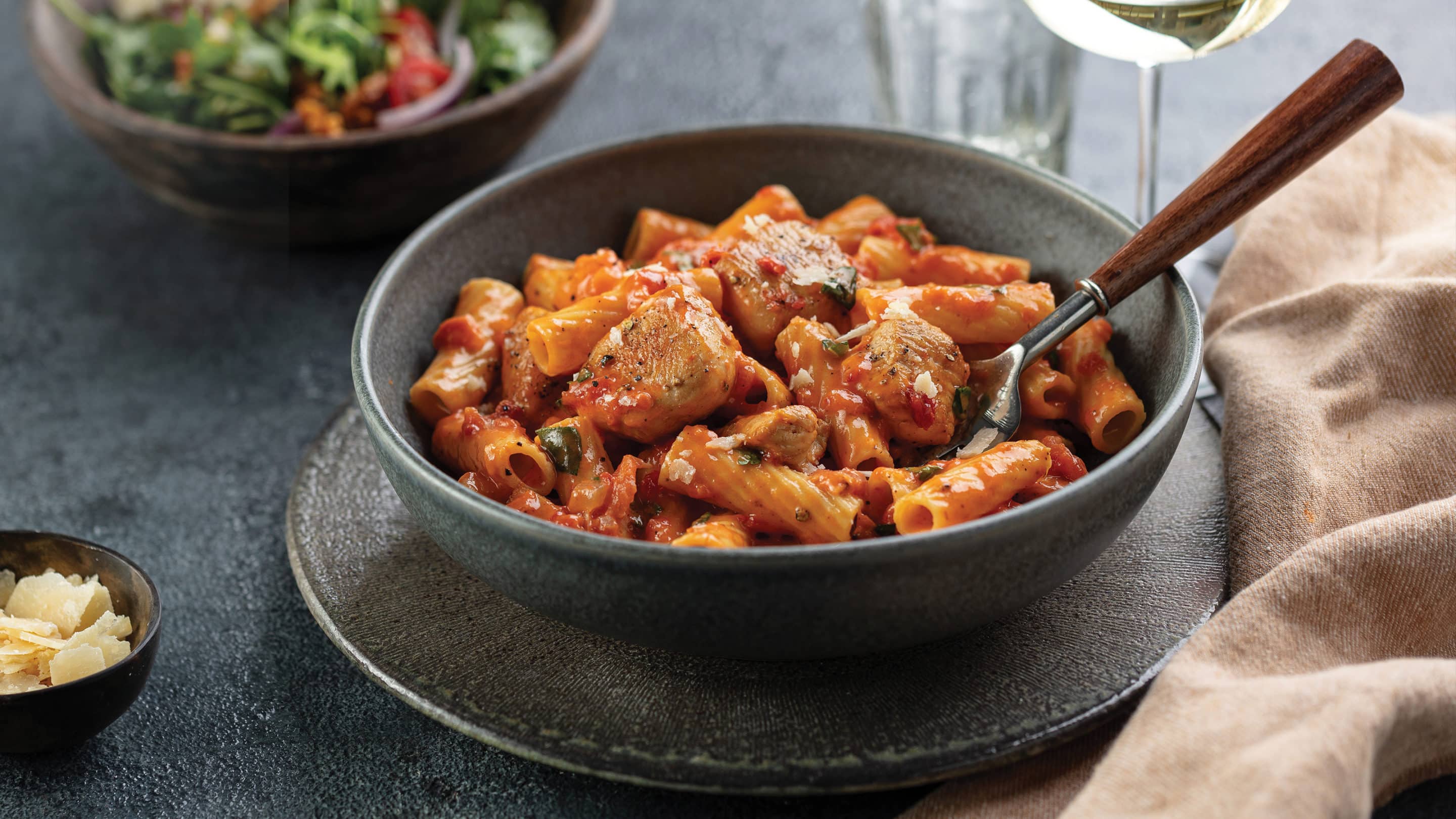 Sun-Dried Tomato Penne alla Vodka with Chicken in bowl