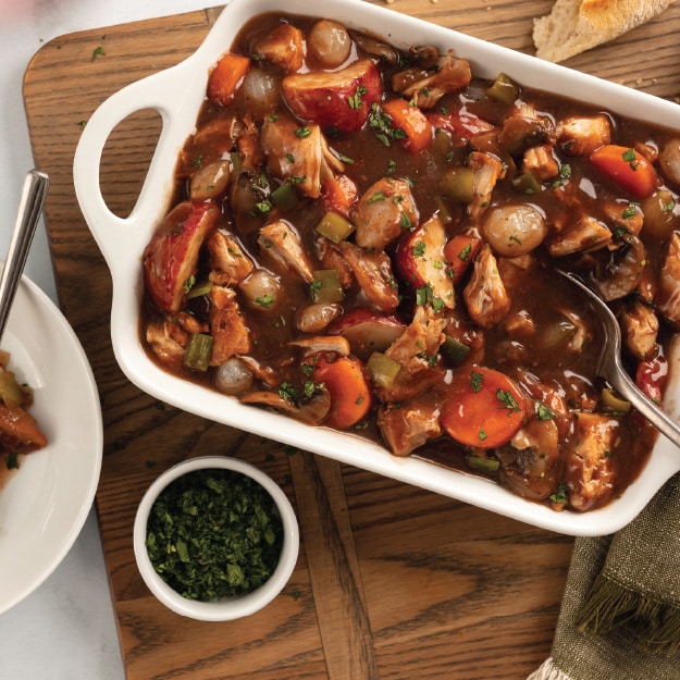 baked Coq au Vin in casserole dish