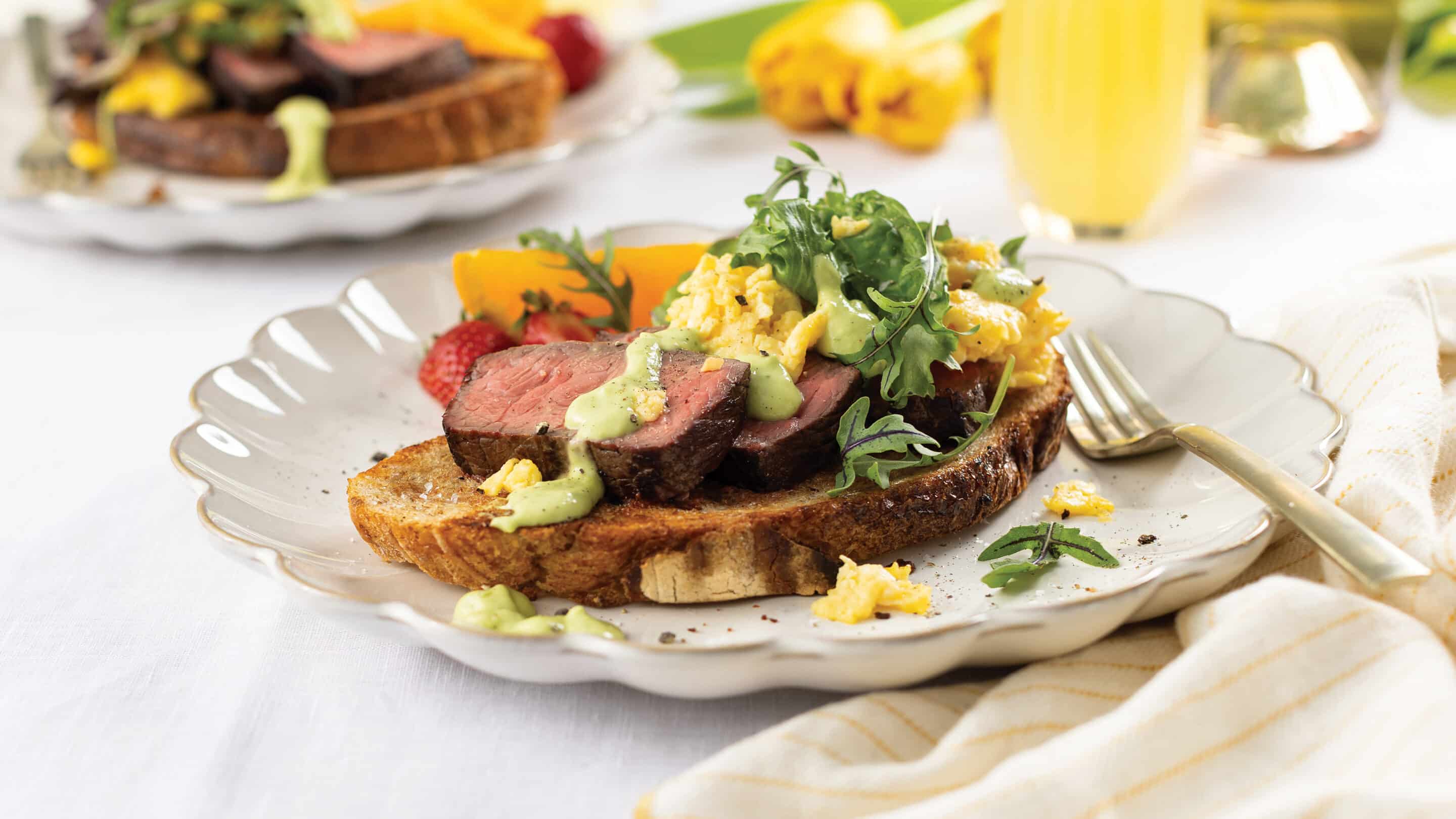 Top Sirloin Steak, Cheesy Scrambled Eggs, Greens, and Avocado-Cilantro Vinaigrette Recipe