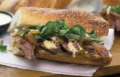 Grilled Beef Sandwich with Caramelized Sweet Onion Honey-Ginger Mustard, and Watercress