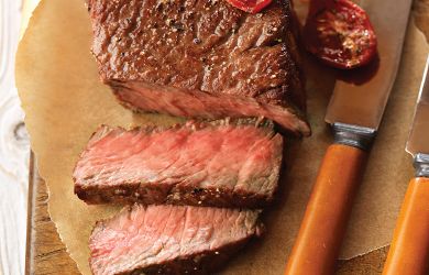 Lemon-Pepper Seasoned Ribeye Steaks with Roasted Tomatoes